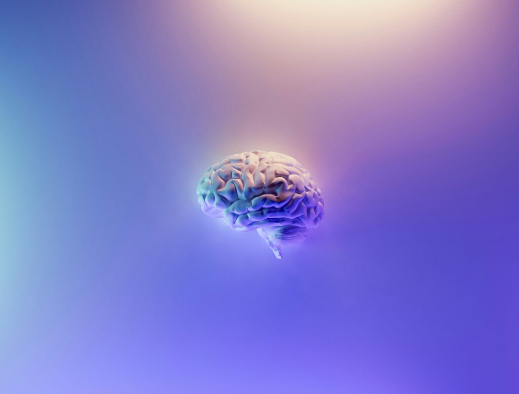 Blue and purple graphic picture of a brain. MS