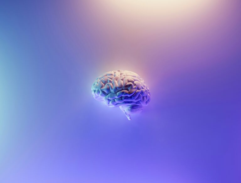Blue and purple graphic picture of a brain. MS